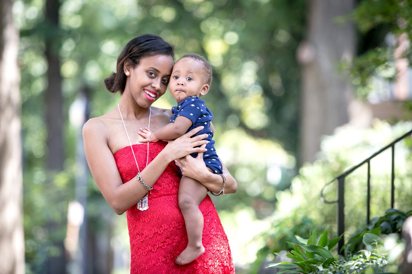 A mother holding her baby